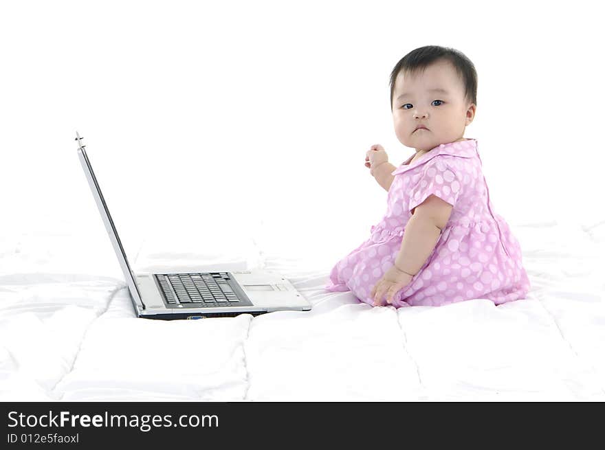 Small baby with laptop isolated. Small baby with laptop isolated