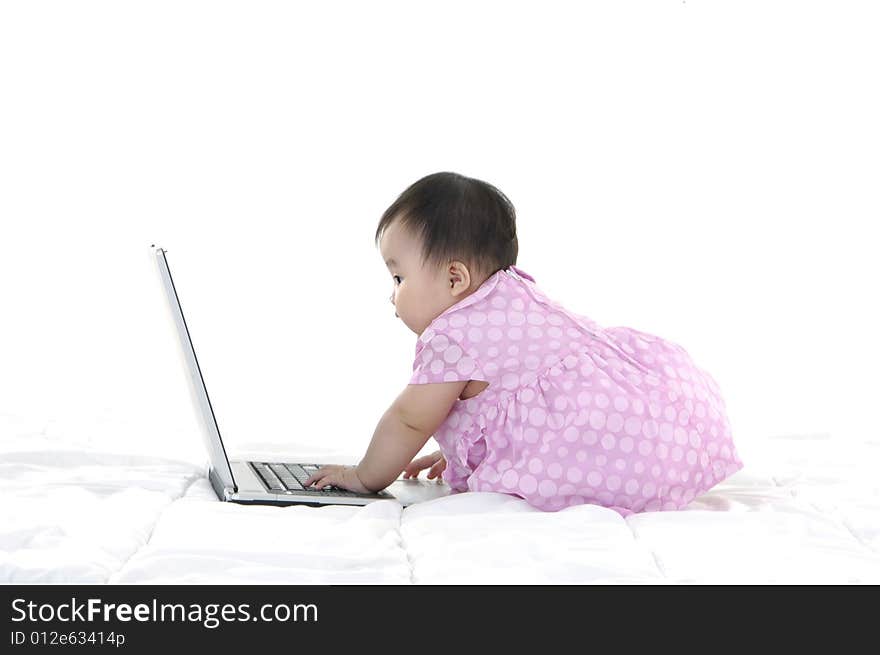 Small baby with laptop isolated. Small baby with laptop isolated