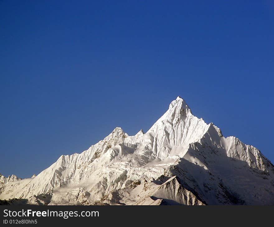 Meili snow mountain,in Yunan,China, which still a snow mountain that no one can climb on the top of it. Meili snow mountain,in Yunan,China, which still a snow mountain that no one can climb on the top of it.