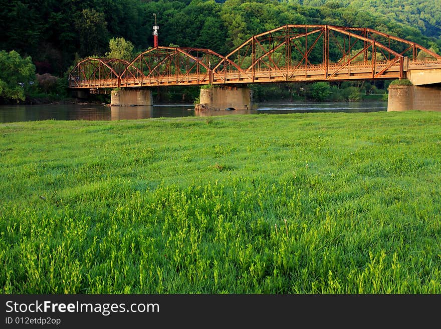 Old metal bridge over Mures River, Romania