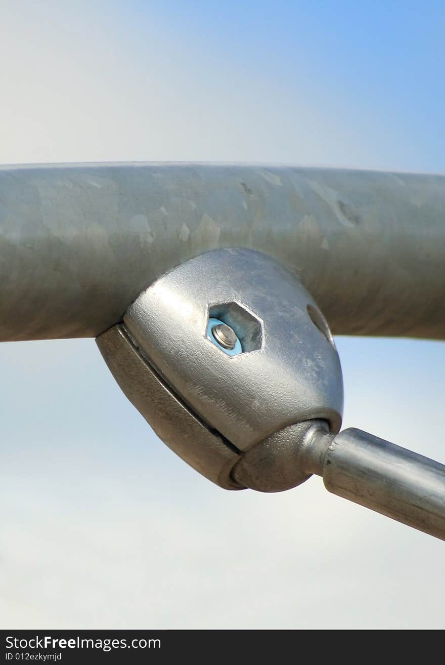 Detail of an aluminimum connection on some playground equipment. Detail of an aluminimum connection on some playground equipment