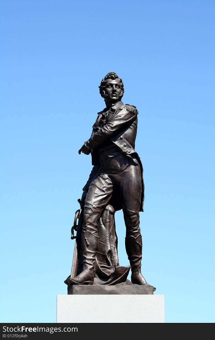 Statue of a man on a beautiful blue sky background