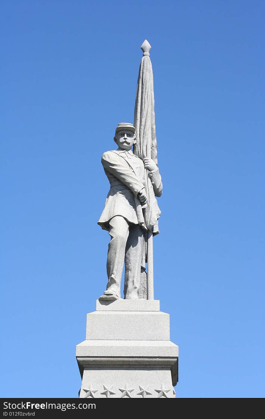 Statue of a man on a beautiful blue sky background