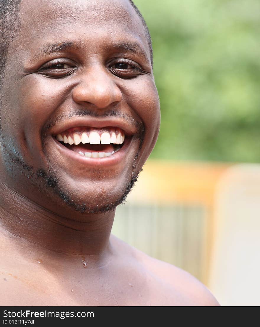 Young African American Male Laughing.