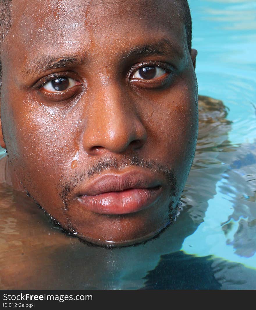 Man's head sticking out of the water. Man's head sticking out of the water