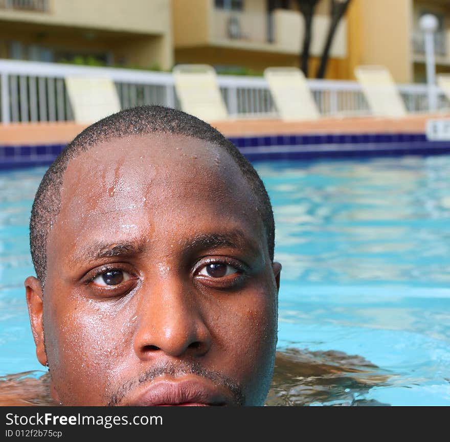 Man's head sticking out of the water. Man's head sticking out of the water