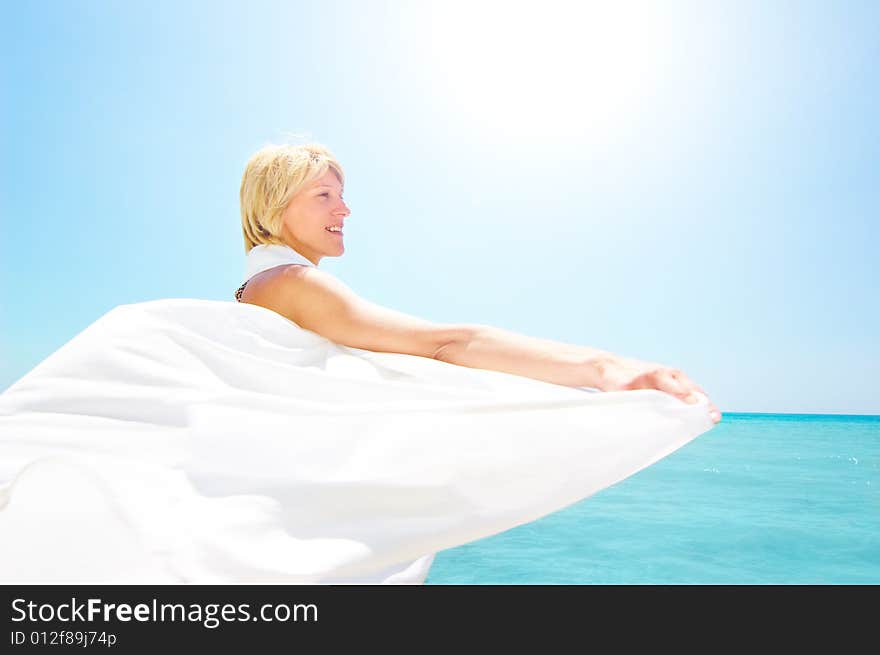 Woman relaxing on the beach