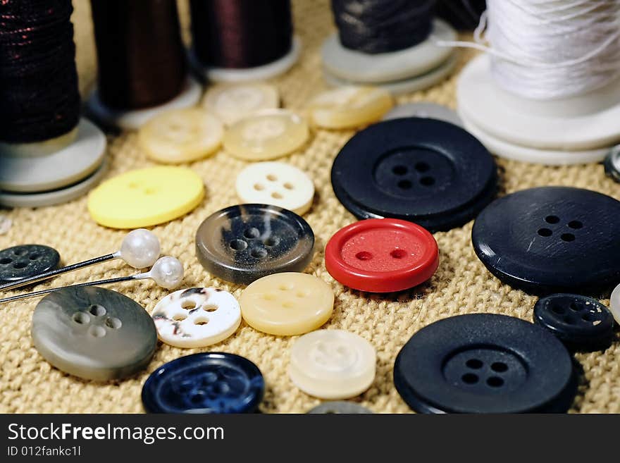 Several sewing material spread over the table.