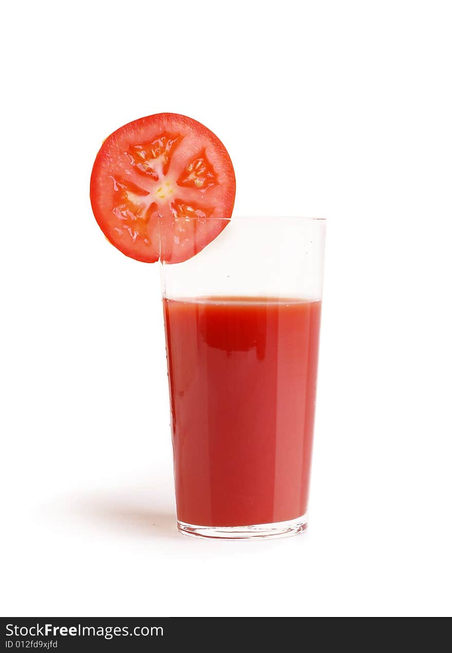 Glass of tomato juice, isolated on white