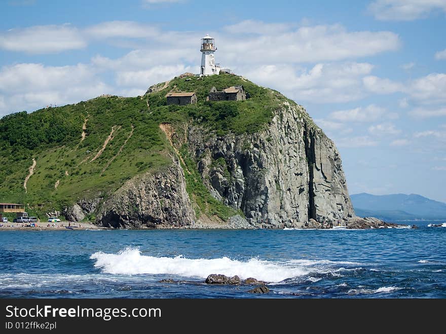 Beacon on a rock on coast of sea of Japan