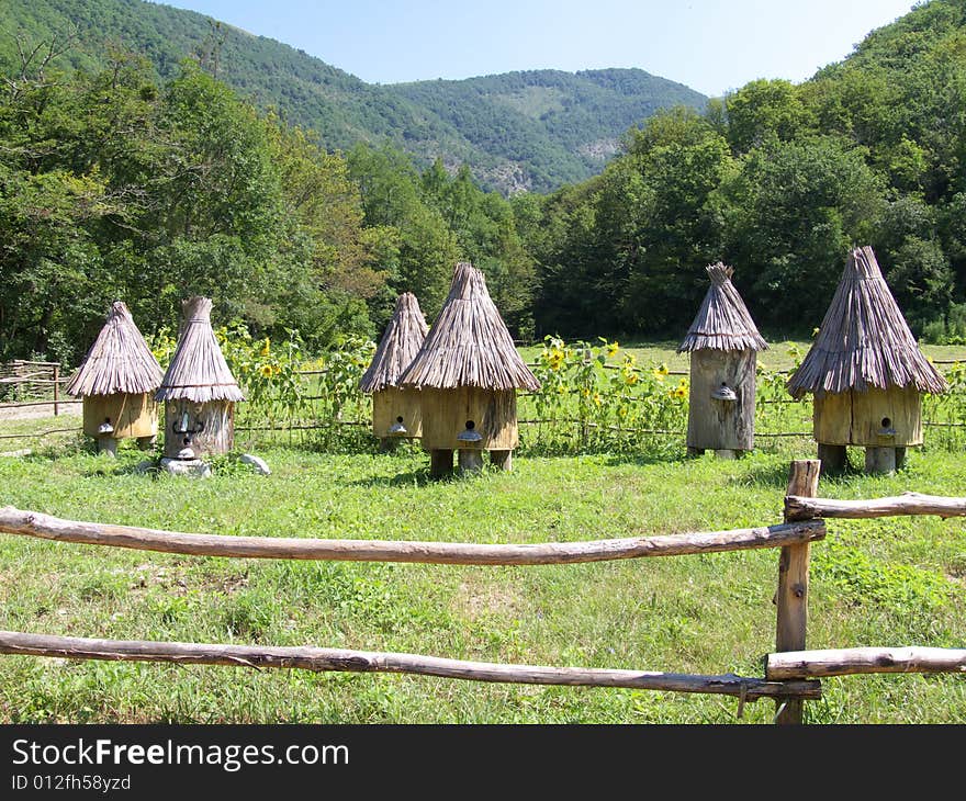 Funny bee home near mountain. Funny bee home near mountain