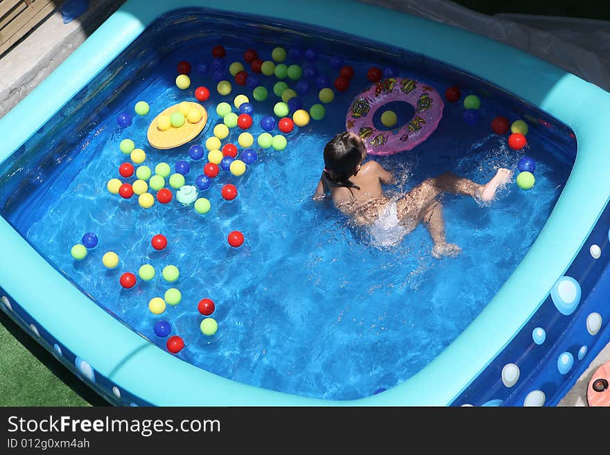 A big blue swimming pool