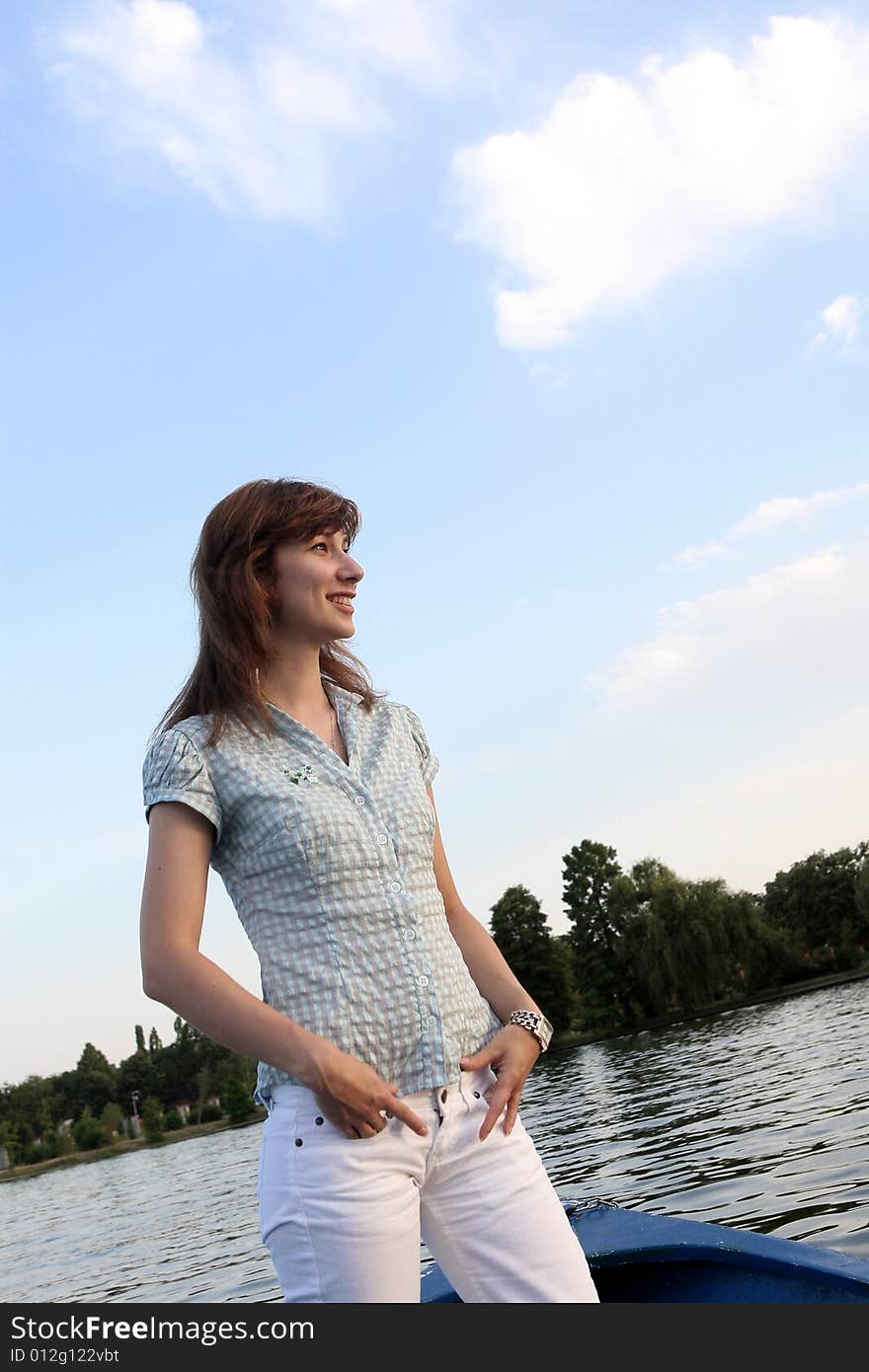 Girl standing on the boat