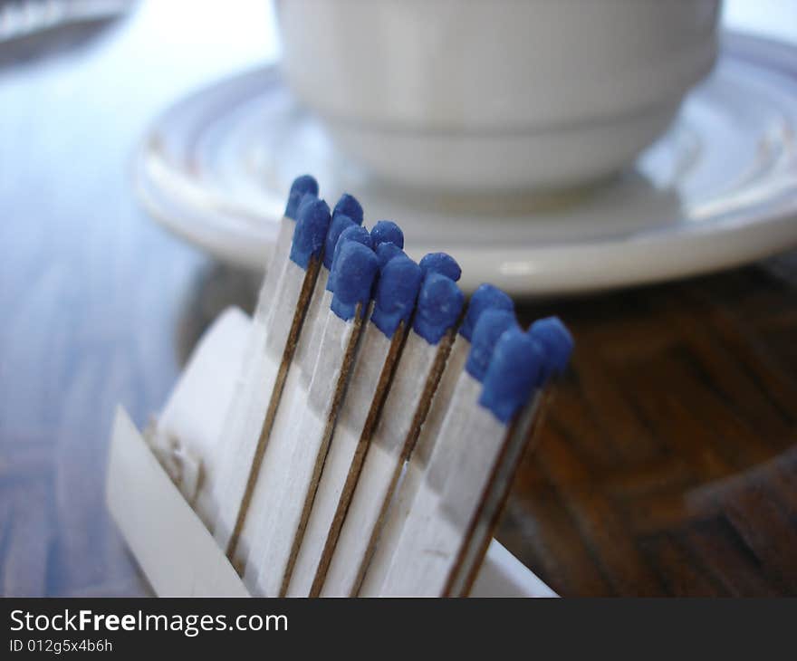 Close-up matches on open air cafe table. Close-up matches on open air cafe table