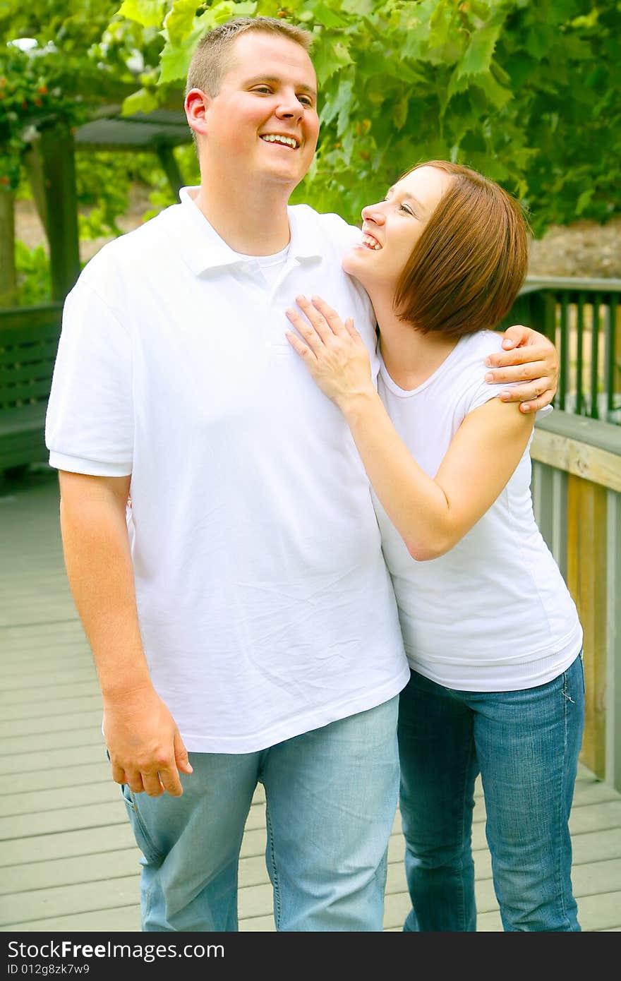 Couple doing evening walk and talking. concept for happiness, love or family. Couple doing evening walk and talking. concept for happiness, love or family