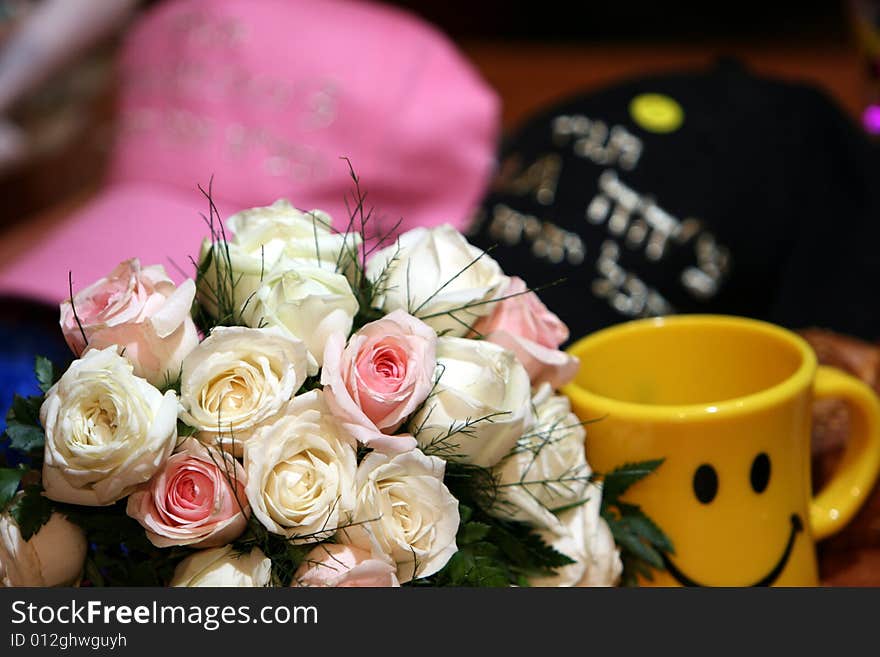 A flower bouquet amidst other objects