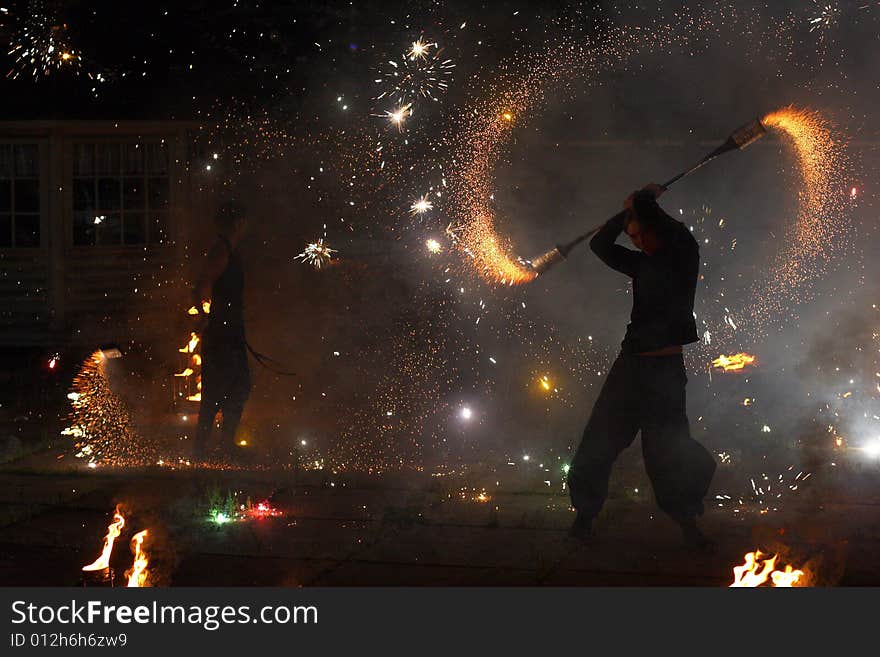 Artist circling the pyrotechnics pole. Artist circling the pyrotechnics pole