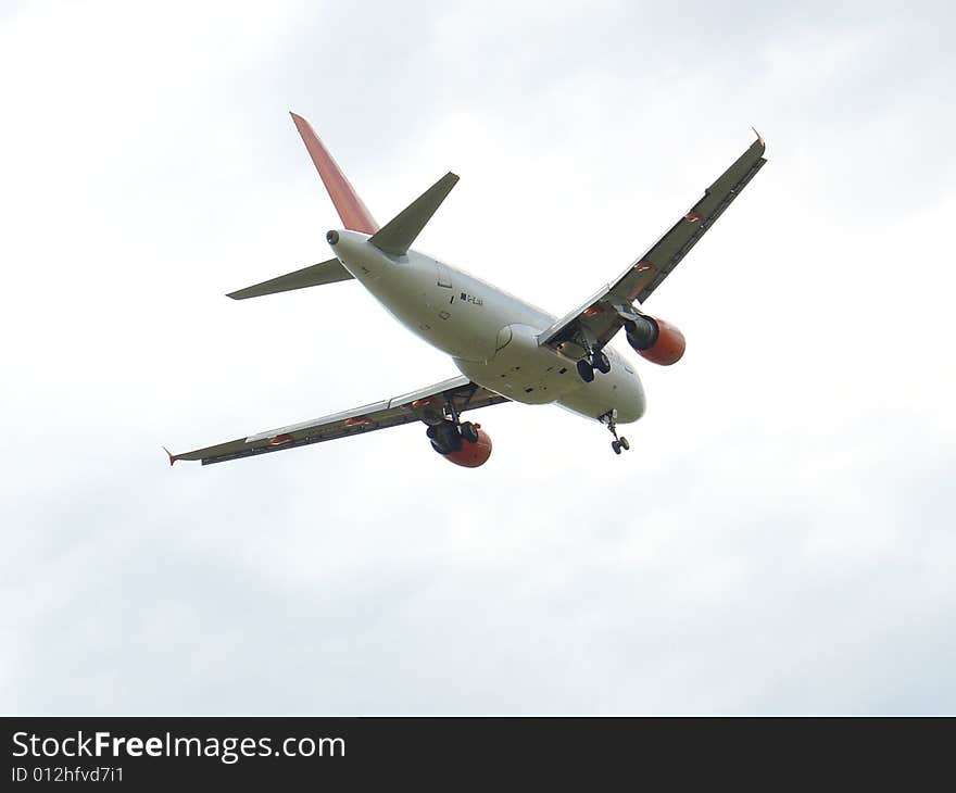 Airbus A319 on final approach to runway 31 of Ruzyne airport in Prague. Airbus A319 on final approach to runway 31 of Ruzyne airport in Prague