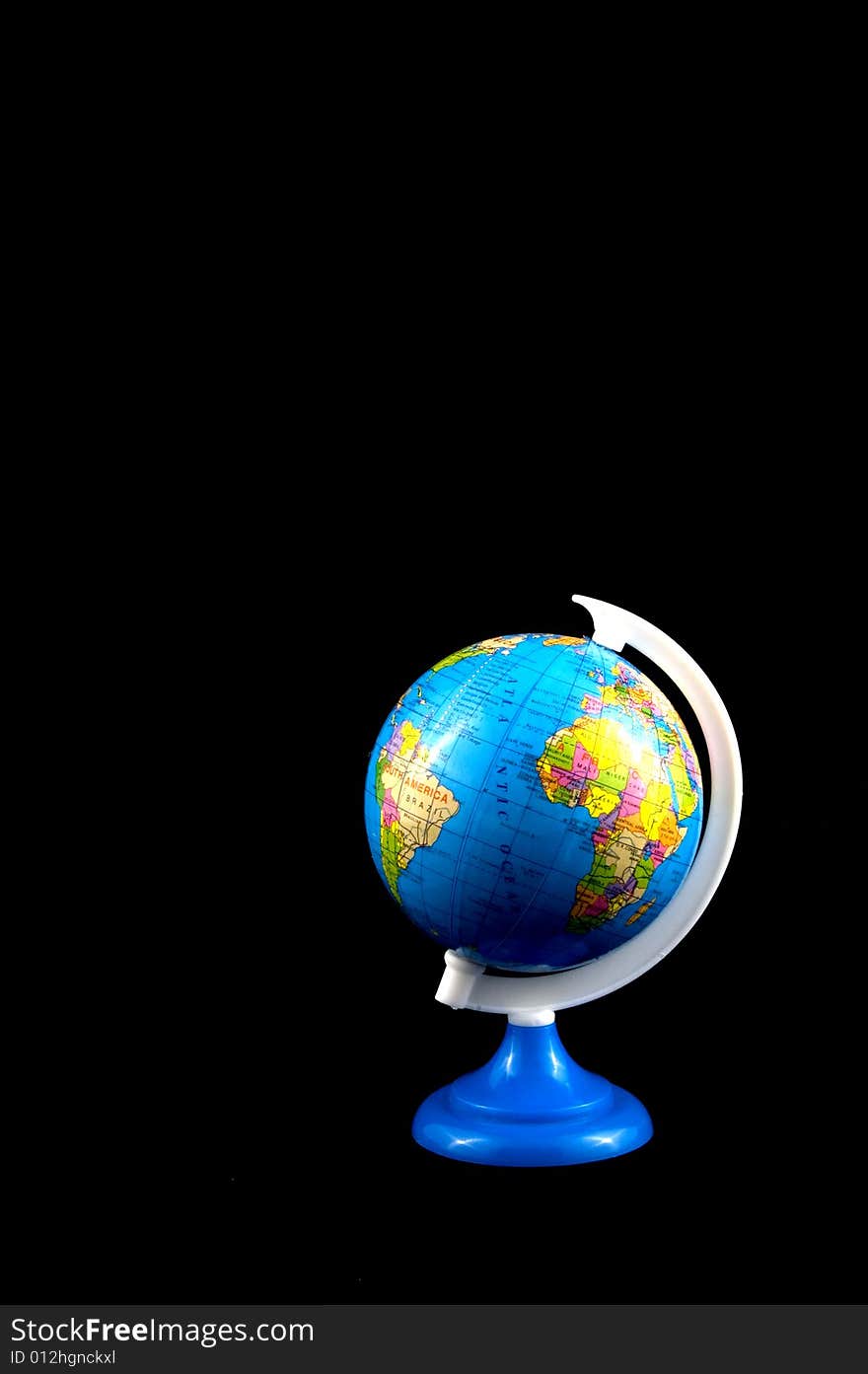 School globe isolated on a black background