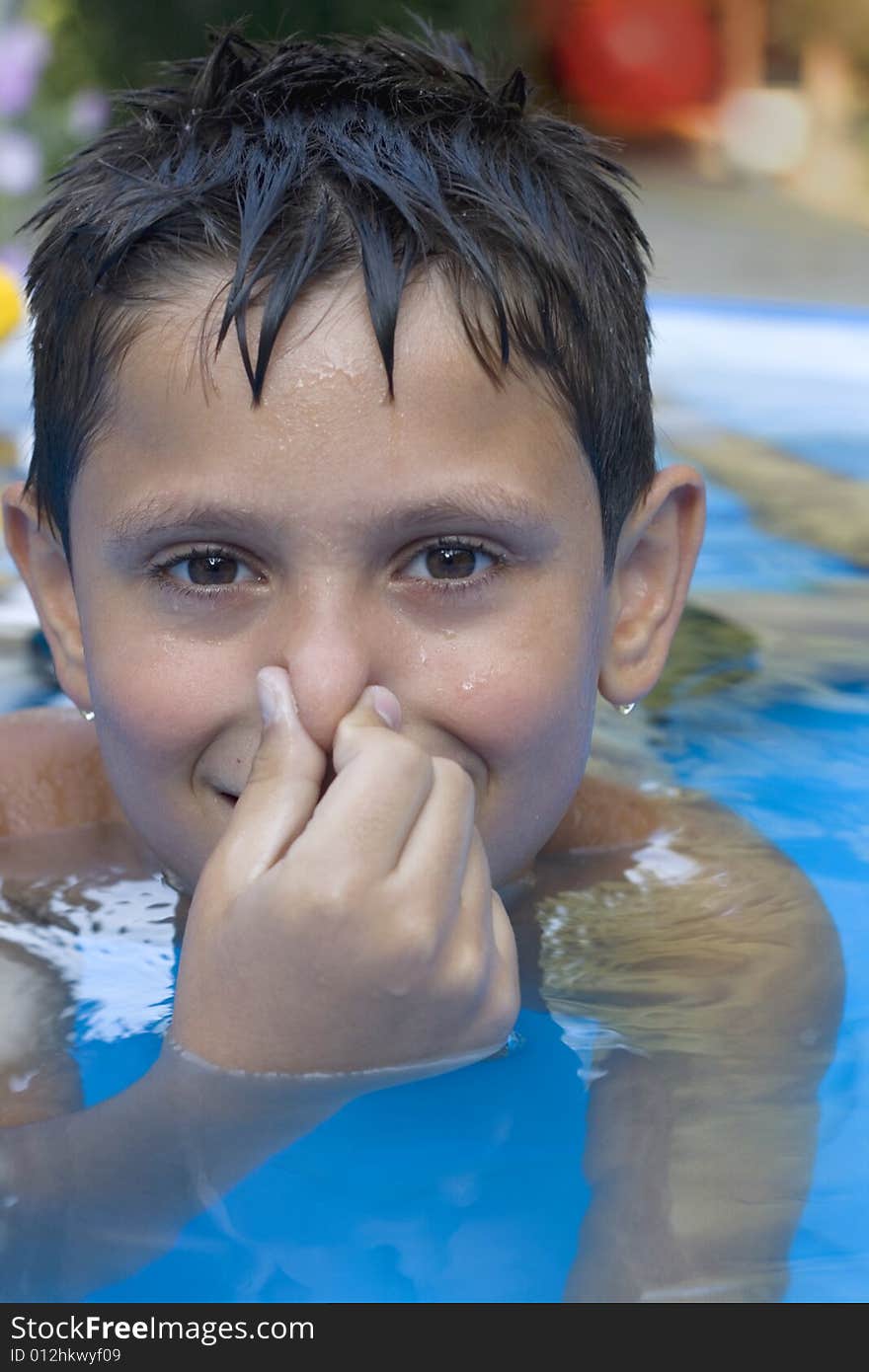 Young boy in pool