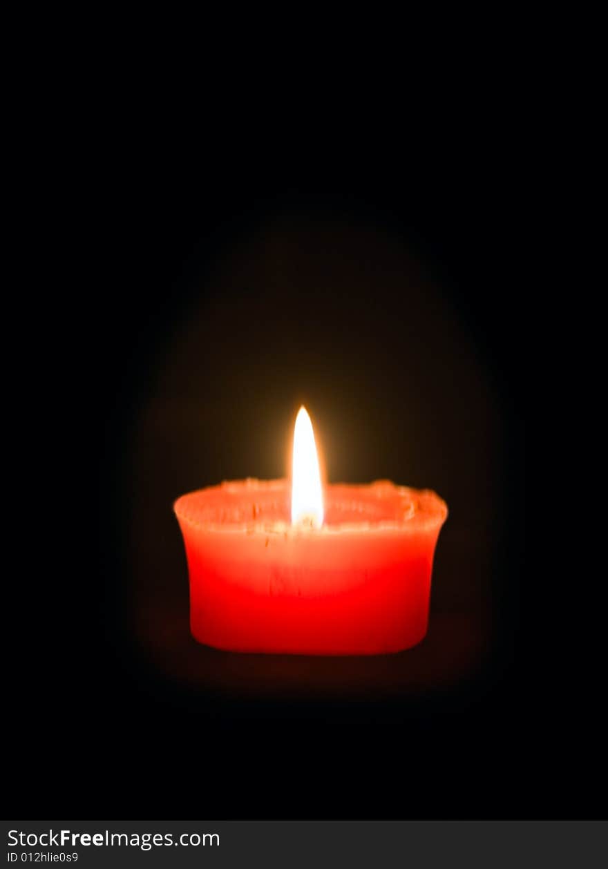 Fire candle on black background for your design