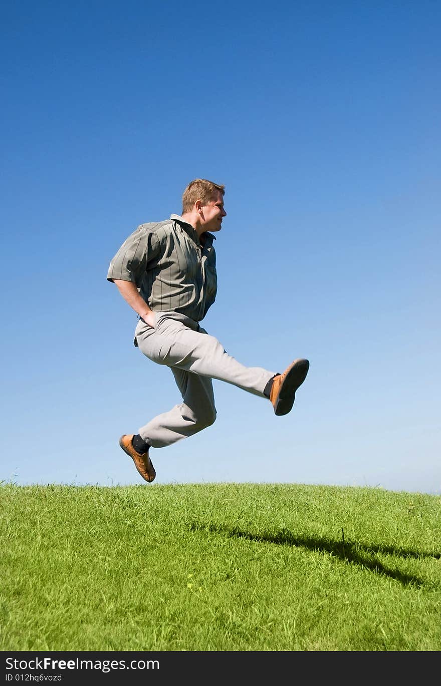 Happy jumping man outdoor