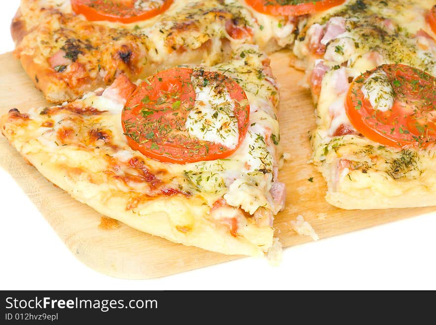 Close-up piece of pizza on board, isolated on white