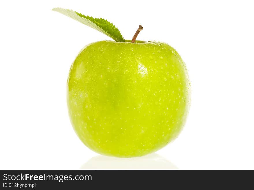 Fresh green apple isolated on white with water droplets