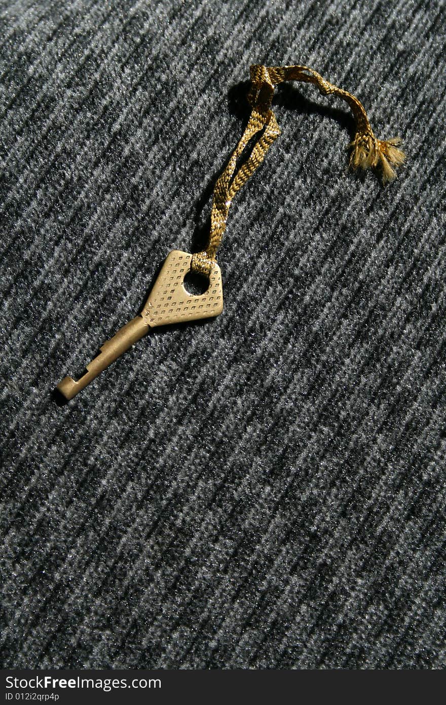 Gold Key on back sitting of the machine