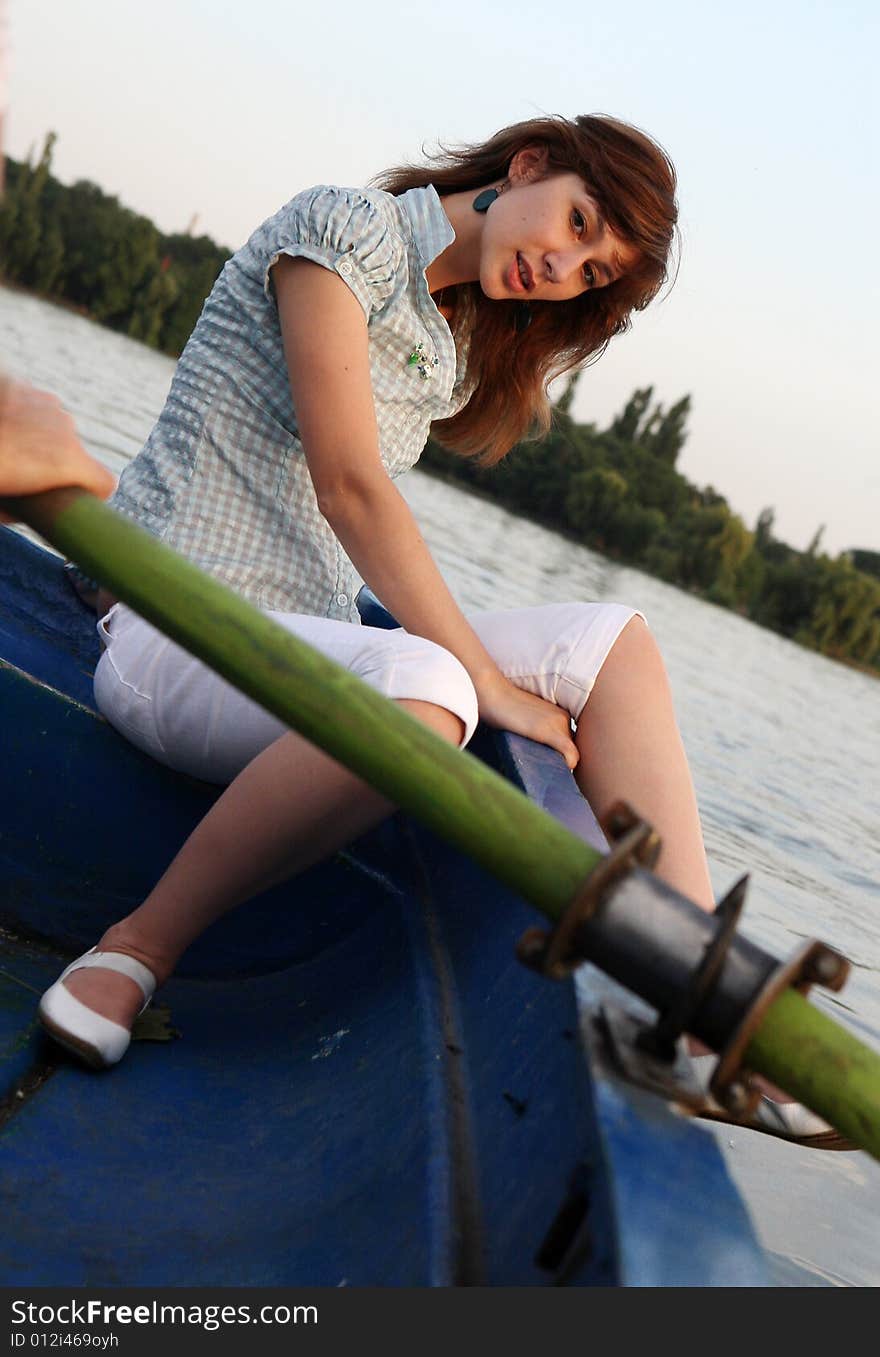 One young and nice girl on the boat. One young and nice girl on the boat