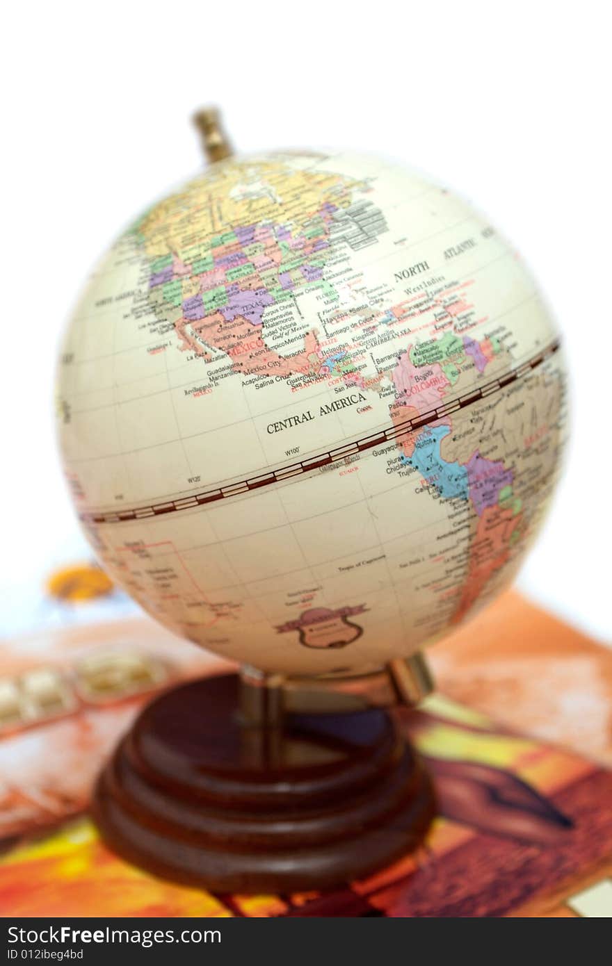 A globe on table on white background