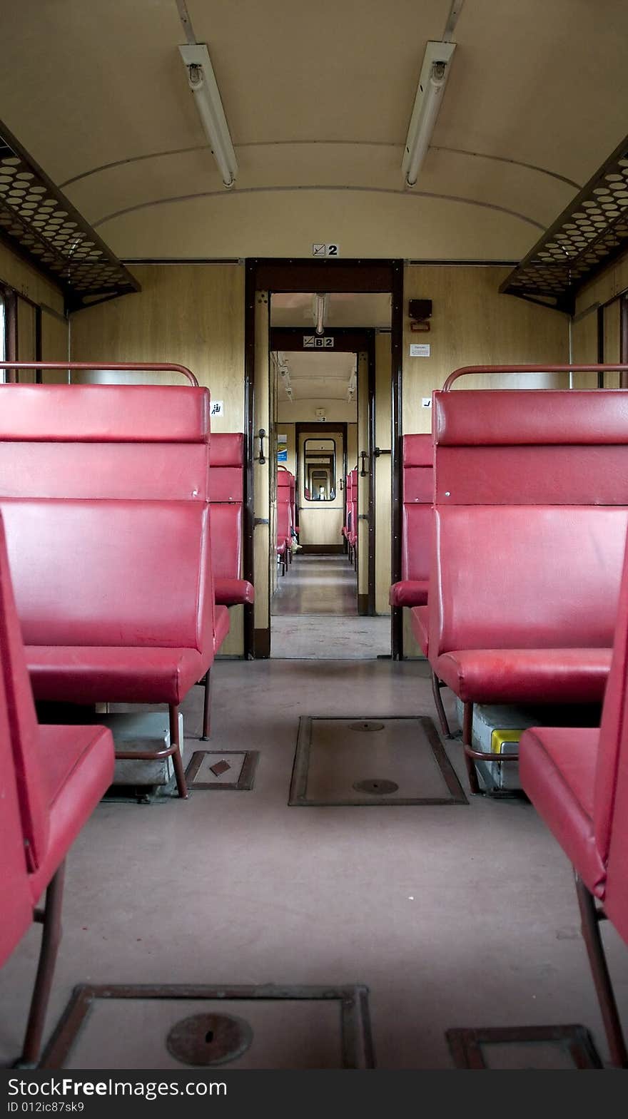 Old fashioned empty train with seats