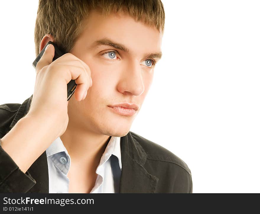 Young handsome man talking on the phone