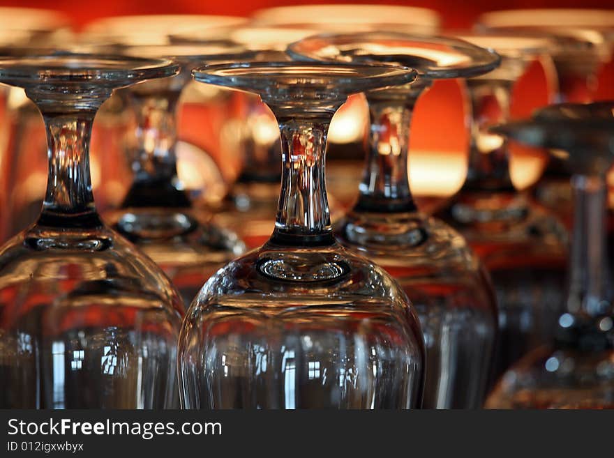 Empty wine glasses with many light reflections.