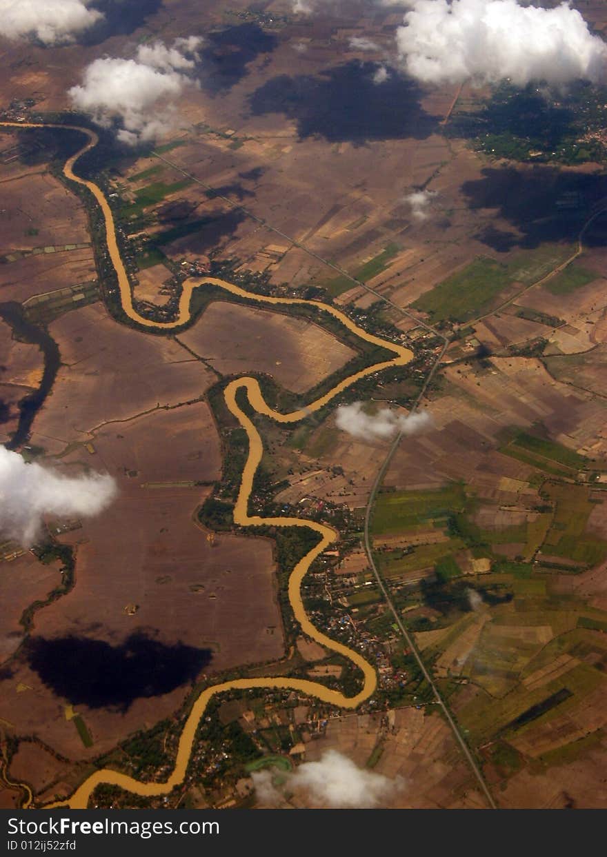 This photo take on the plane when fly on the Thailand.a klong(canal/canalage) flow on earth,consist a funny picture. This photo take on the plane when fly on the Thailand.a klong(canal/canalage) flow on earth,consist a funny picture.