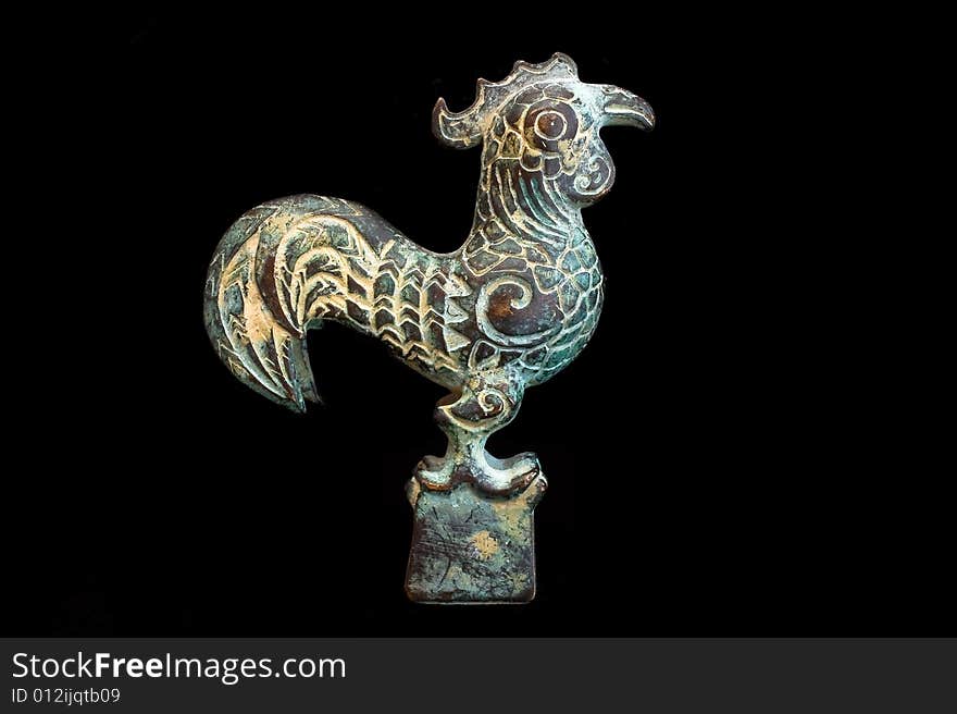 Traditional metal rooster from China. The Rooster is one of the 12-year cycle of animals which appear in the Chinese zodiac. Traditional metal rooster from China. The Rooster is one of the 12-year cycle of animals which appear in the Chinese zodiac.