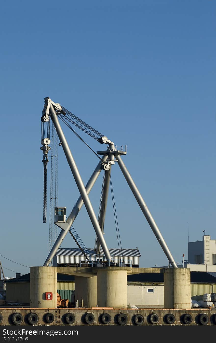 Stationary heavy-lift crane at a harbour.