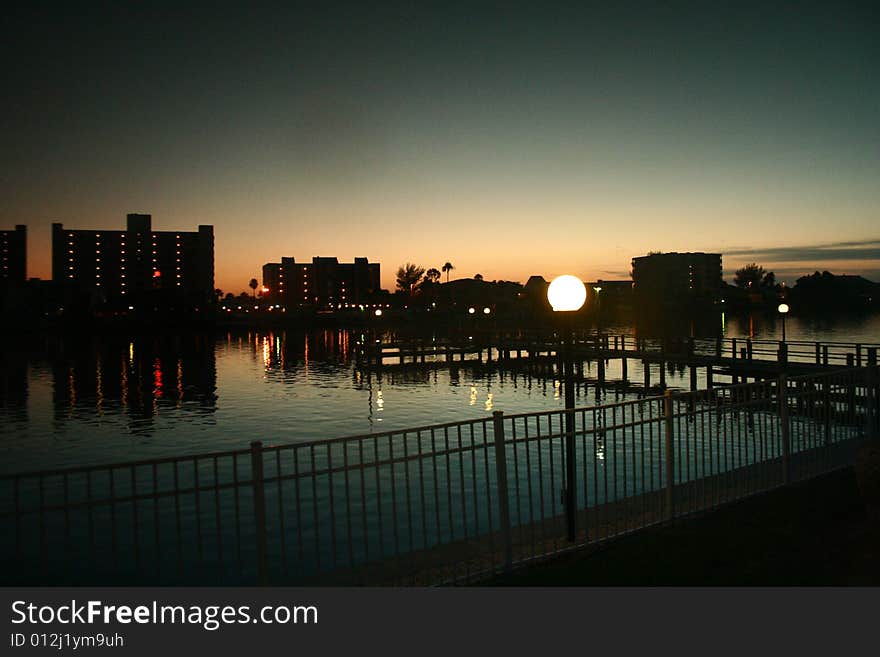 A view of city hotels along the water after sunset in Tampa, Florida. A view of city hotels along the water after sunset in Tampa, Florida.