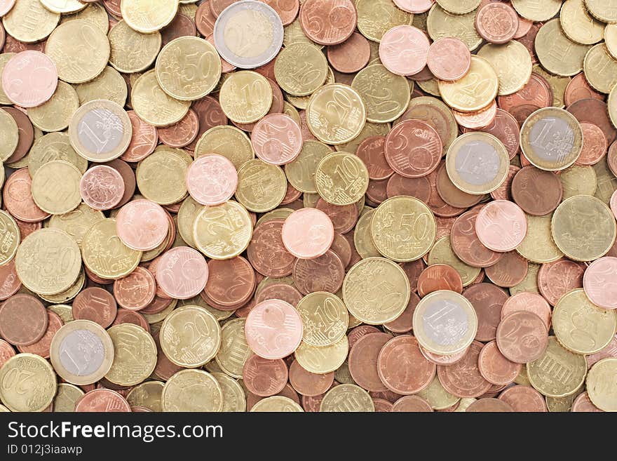 A money-theme background made of euro coins. A money-theme background made of euro coins