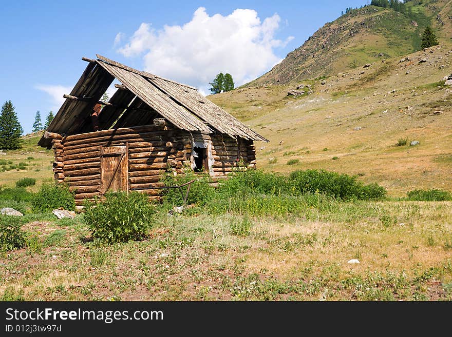 Deserted wood house in mountains. Deserted wood house in mountains