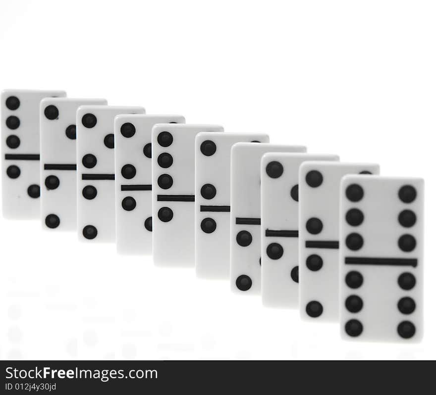 Dominoes on white background, close up