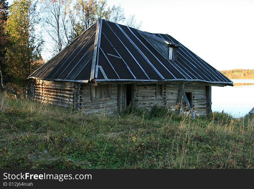 Old lodge in village in Russia