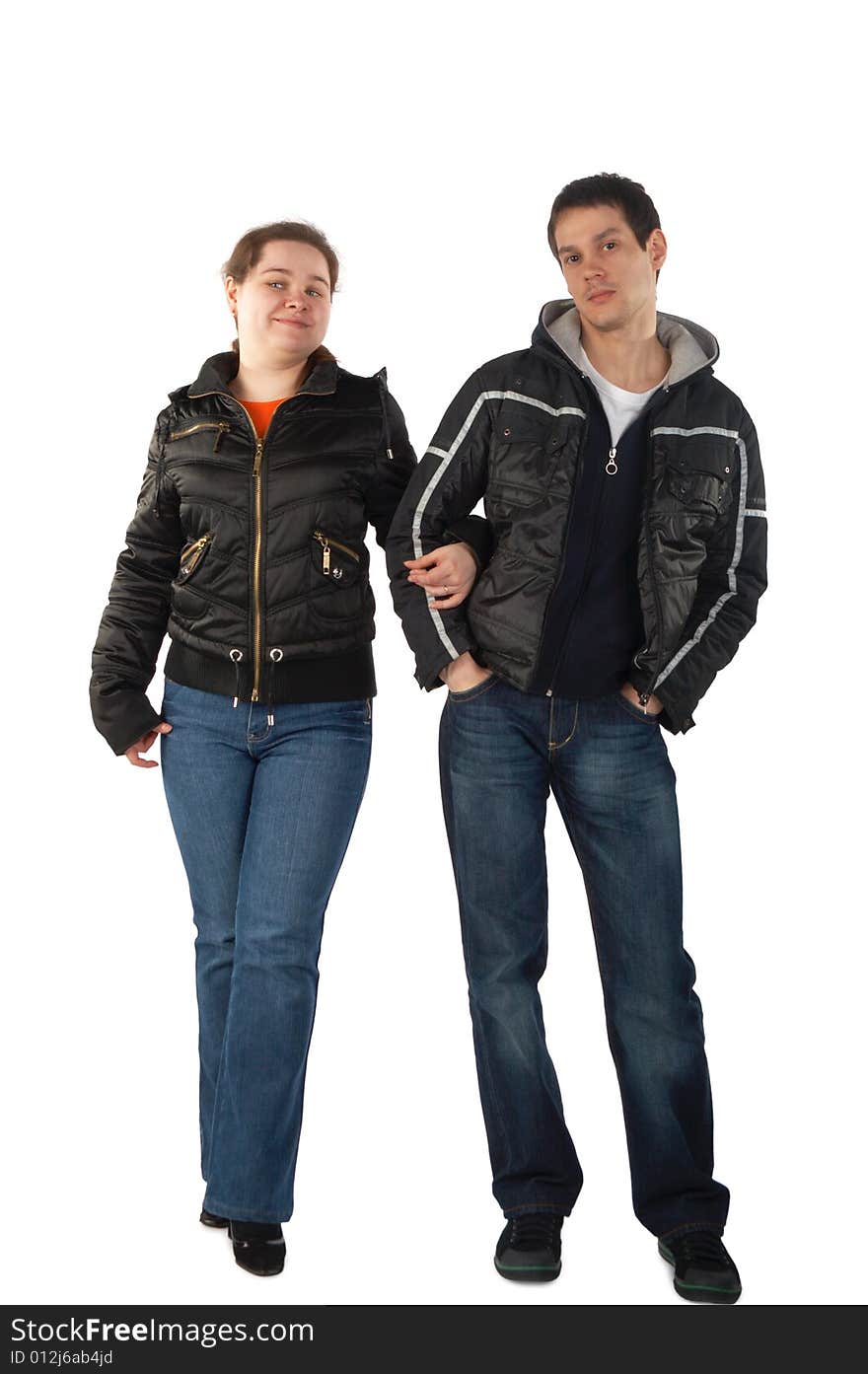 Young man and woman in jackets