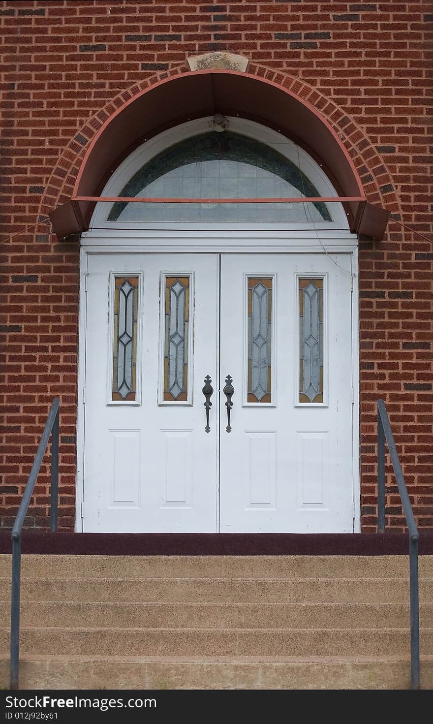 Double door entryway with steps leading up. Double door entryway with steps leading up