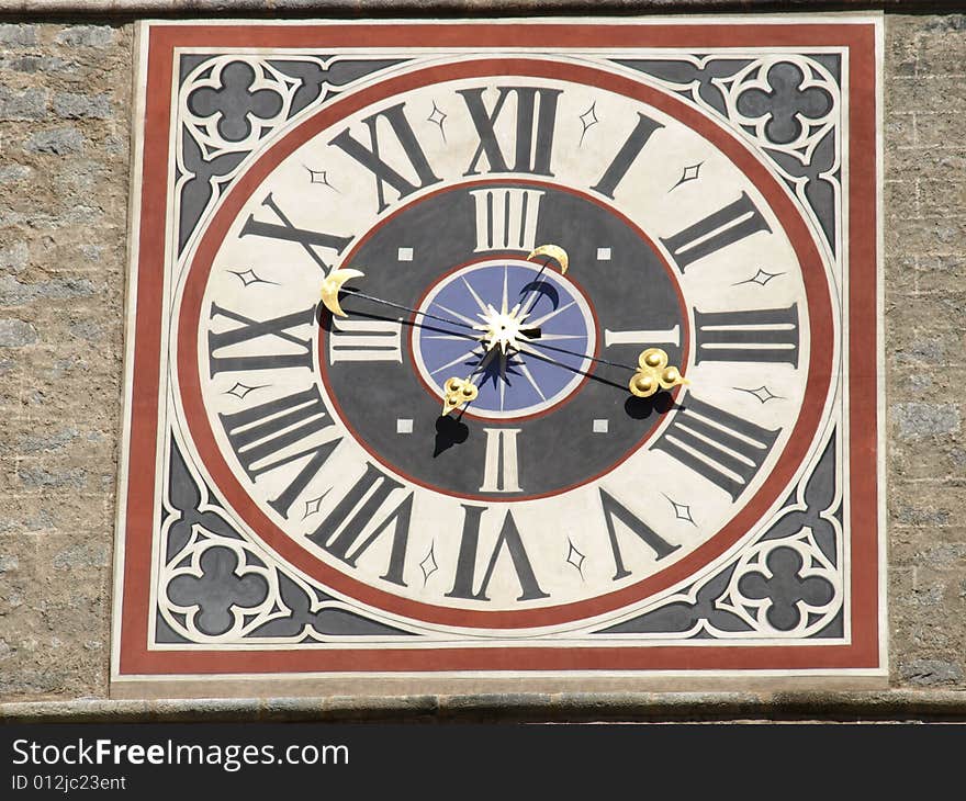 A beautiful shot of the clock of the Bressanone belltower. A beautiful shot of the clock of the Bressanone belltower