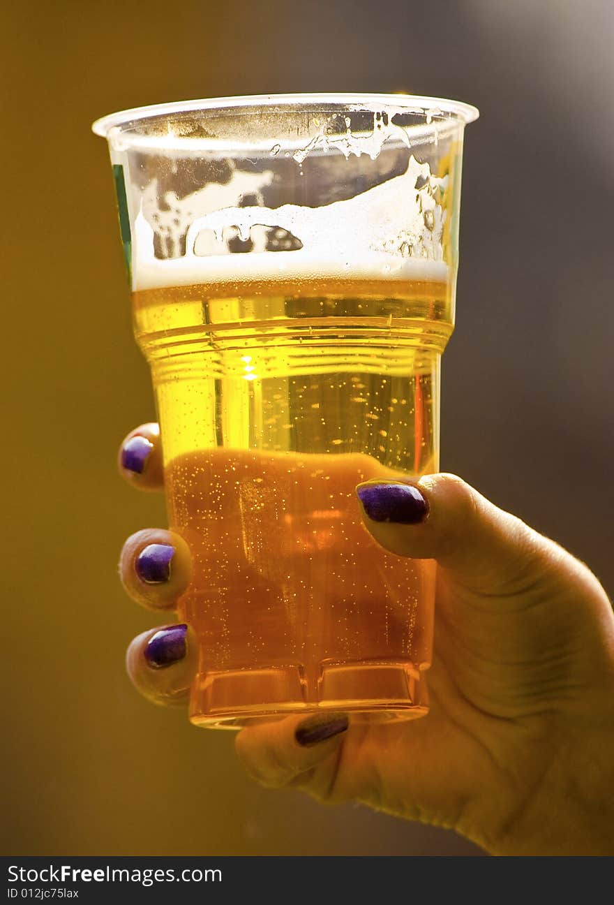 Glass beer in women hand. Glass beer in women hand