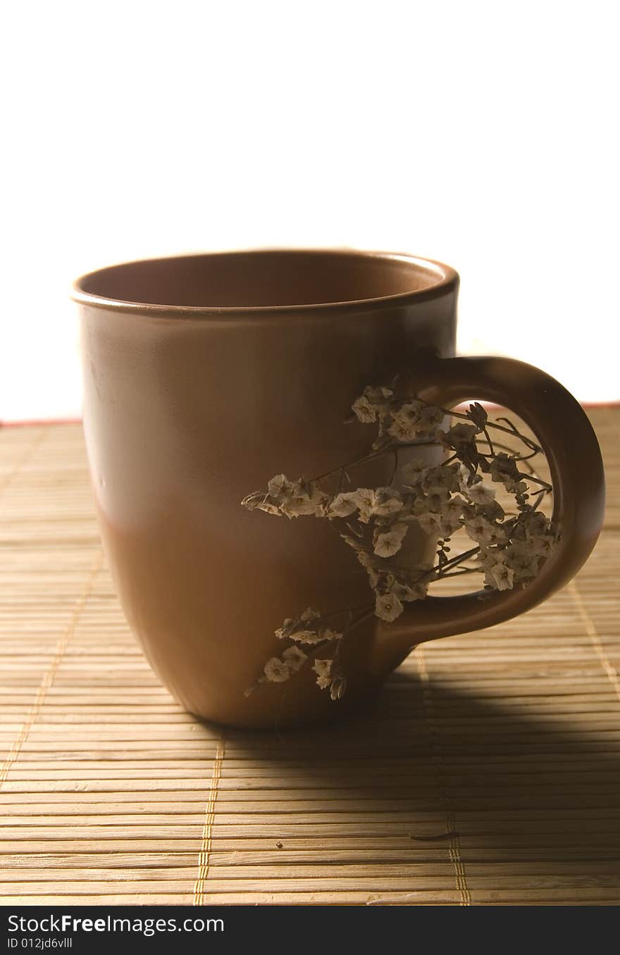 Coffee mug with dried flowers