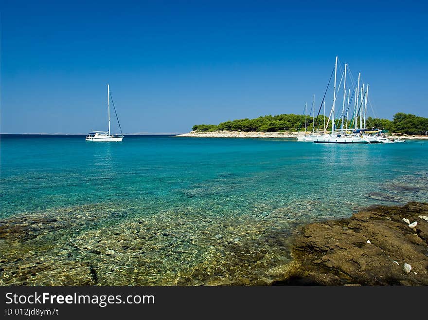 Sail boats docked in beautiful bay, Adriatic sea, Croatia