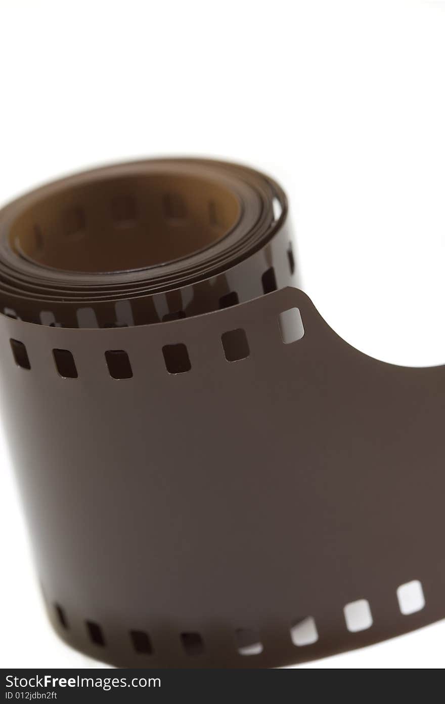 A roll of 35mm film, isolated on white. A roll of 35mm film, isolated on white.