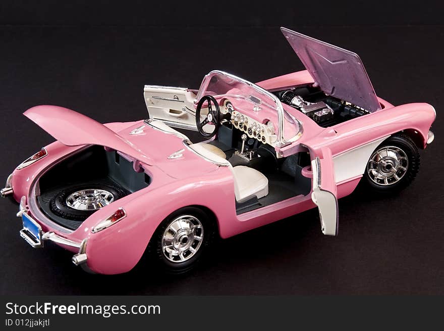 Picture of a pink beautiful classic muscle car. Picture of a pink beautiful classic muscle car